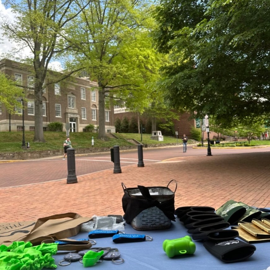 tabling with summit merchandise on Ohio University's campus